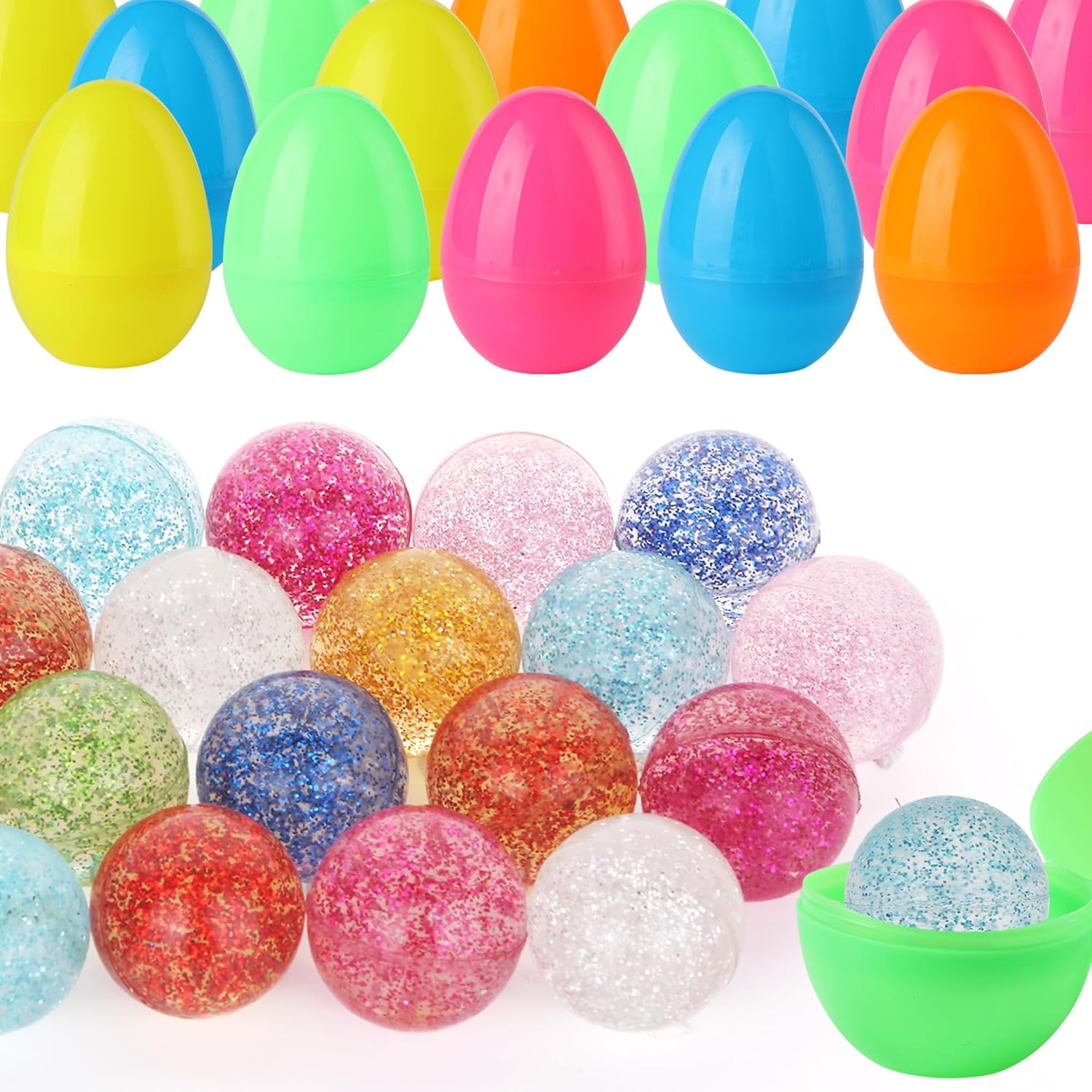 Colorful plastic eggs and glittery balls on a white background