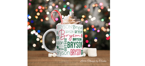 Personalized mug with 'Bryson' pattern, hot chocolate, and candy canes against a blurred Christmas tree background.
