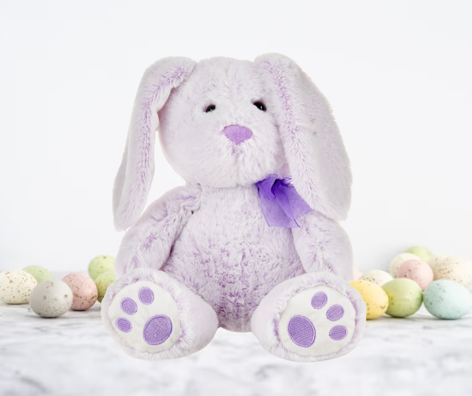 Plush bunny toy with purple accents on a white background