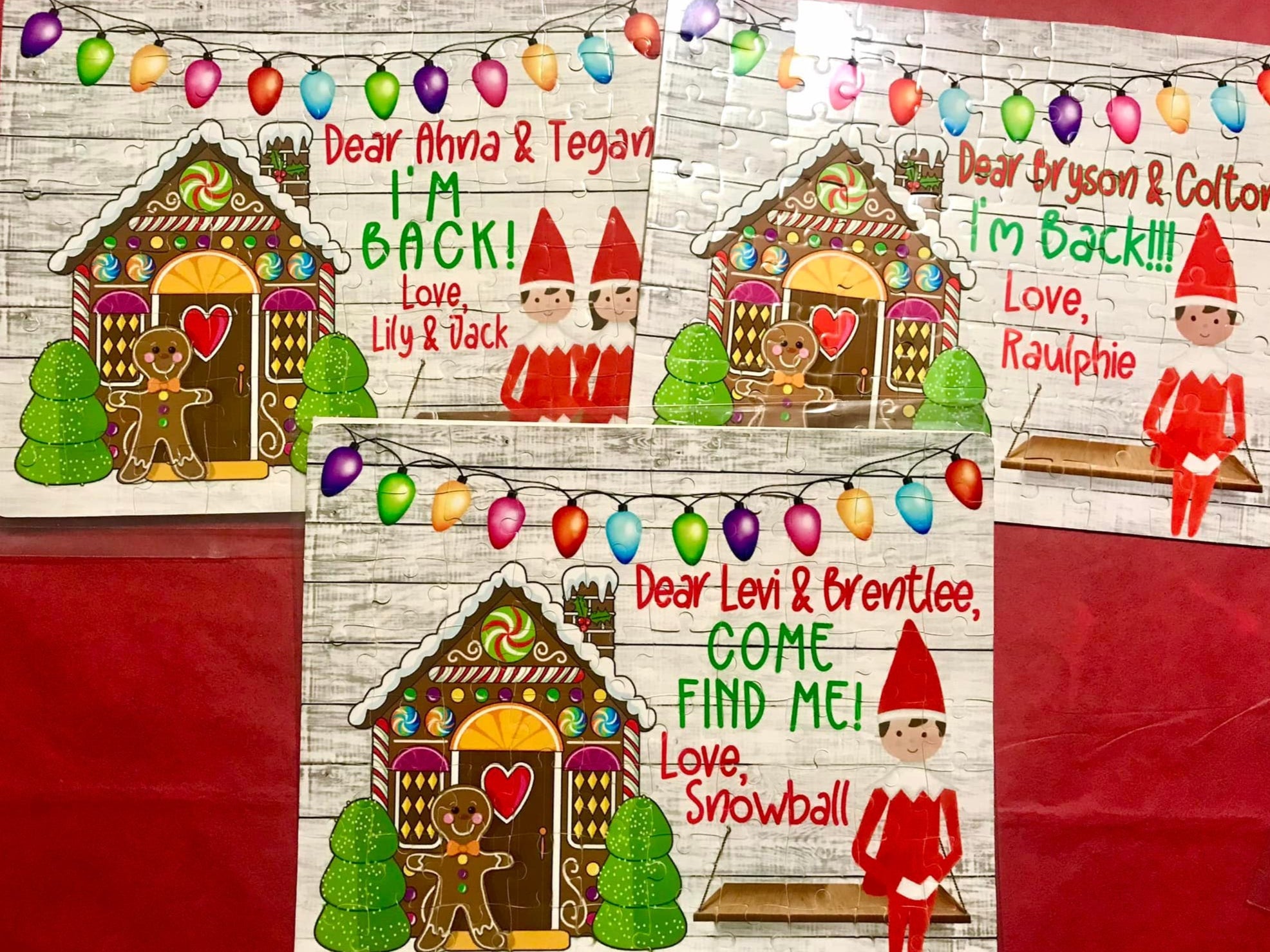 Three personalized Christmas cards with elves and gingerbread houses on a red background. Puzzles